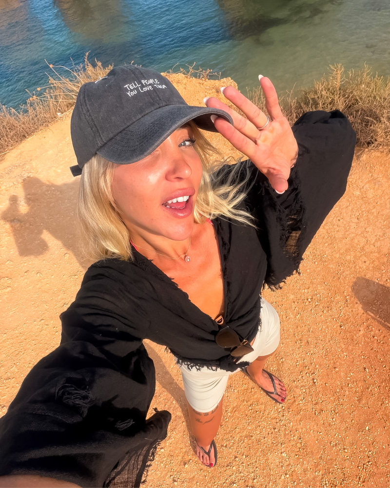 vintage cappy black washed mit spruch tell people you love them 